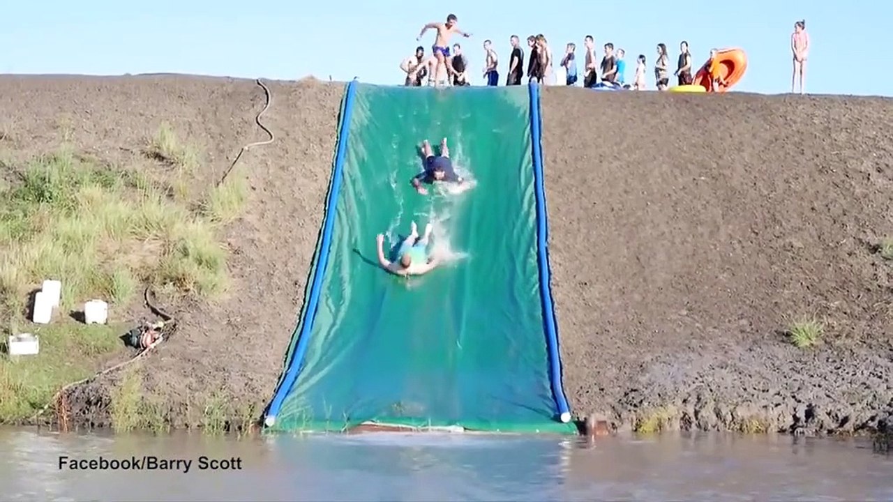 Farmer Nathan Tappenden has made a waterslide to beat the heat