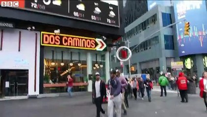 Tourists enjoy shorts weather in New York