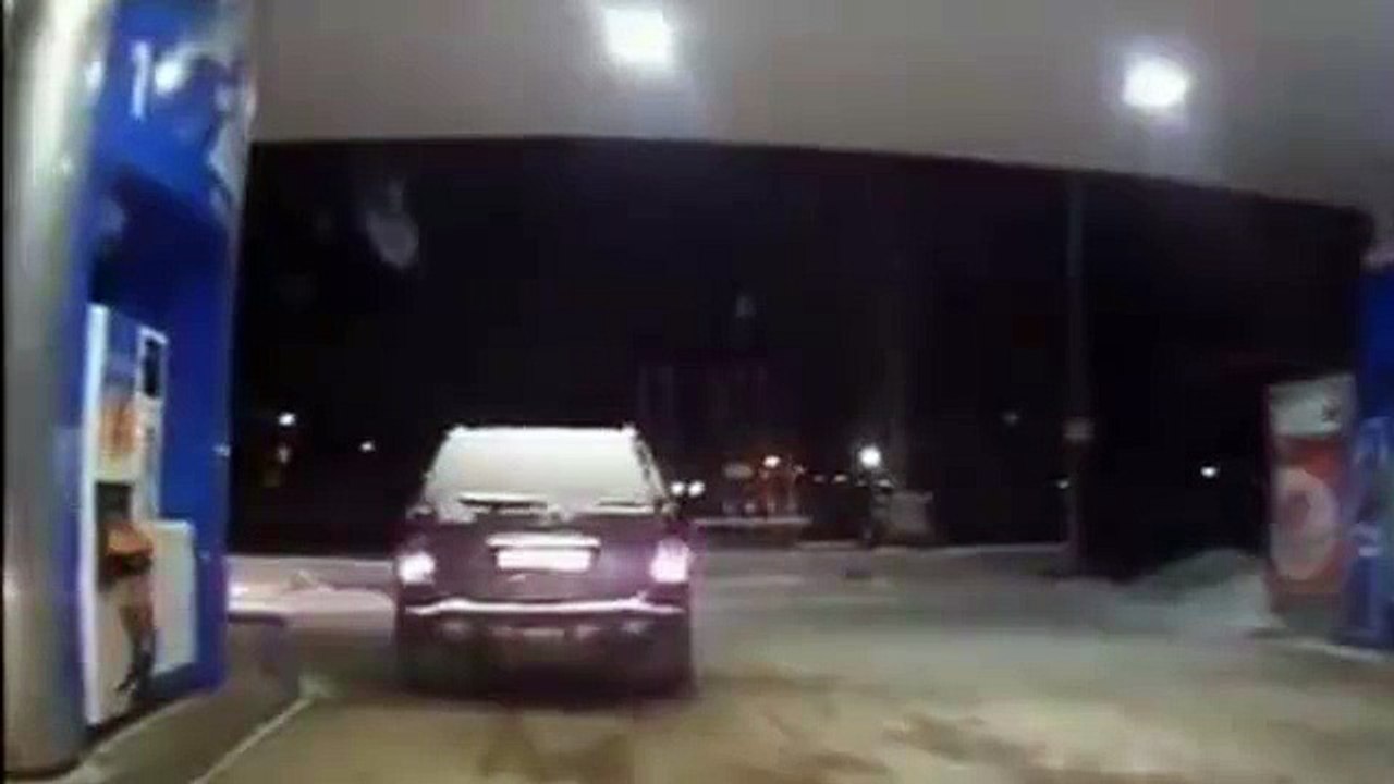 A drunk driver at a gas station