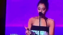 Ariana Grande breaks down in tears as she takes to the stage at the American Music Awards