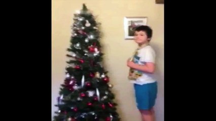 Son Helps Decorate Christmas Tree