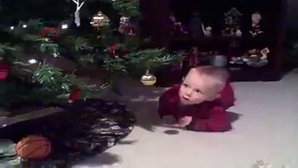 Tiny Tot Chases Runaway Christmas Ornament