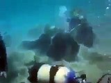 Scuba Diving team performing prayer under water - GoodNewsTv