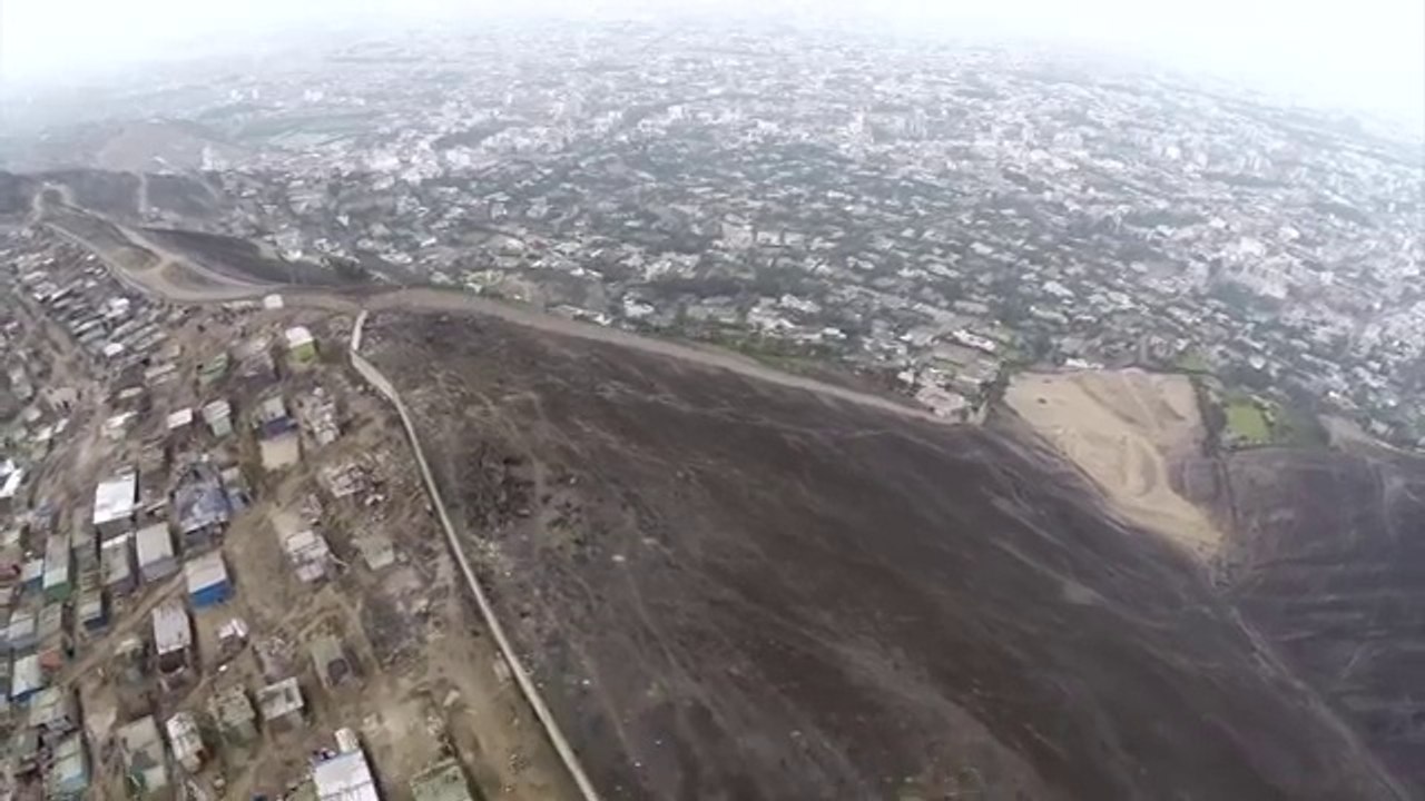 Wall of Shame Built in Peru to Divide Rich and Poor