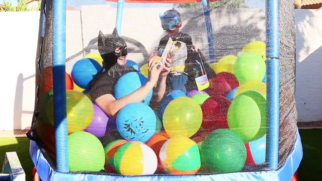 Worlds BIGGEST BATMAN Balloon Pit! Little Tikes Trampoline with Little Batman Surprise Toys