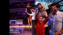 Bindi Irwin looks giddy as she holds up her Mirrorball trophy after winning DWTS