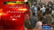PTI workers chant slogan against Ali Zaidi & Arif Alvi during Imran Khan's arrival in Karachi