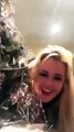 Drunk woman dancing with her christmas tree...
