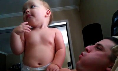 Baby waking up daddy