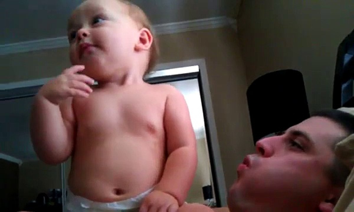 Baby waking up daddy