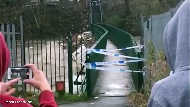 Terrifying moment bridge collapses and explodes after floods