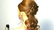 Romantic prom hairstyle for long hair with braided flower.