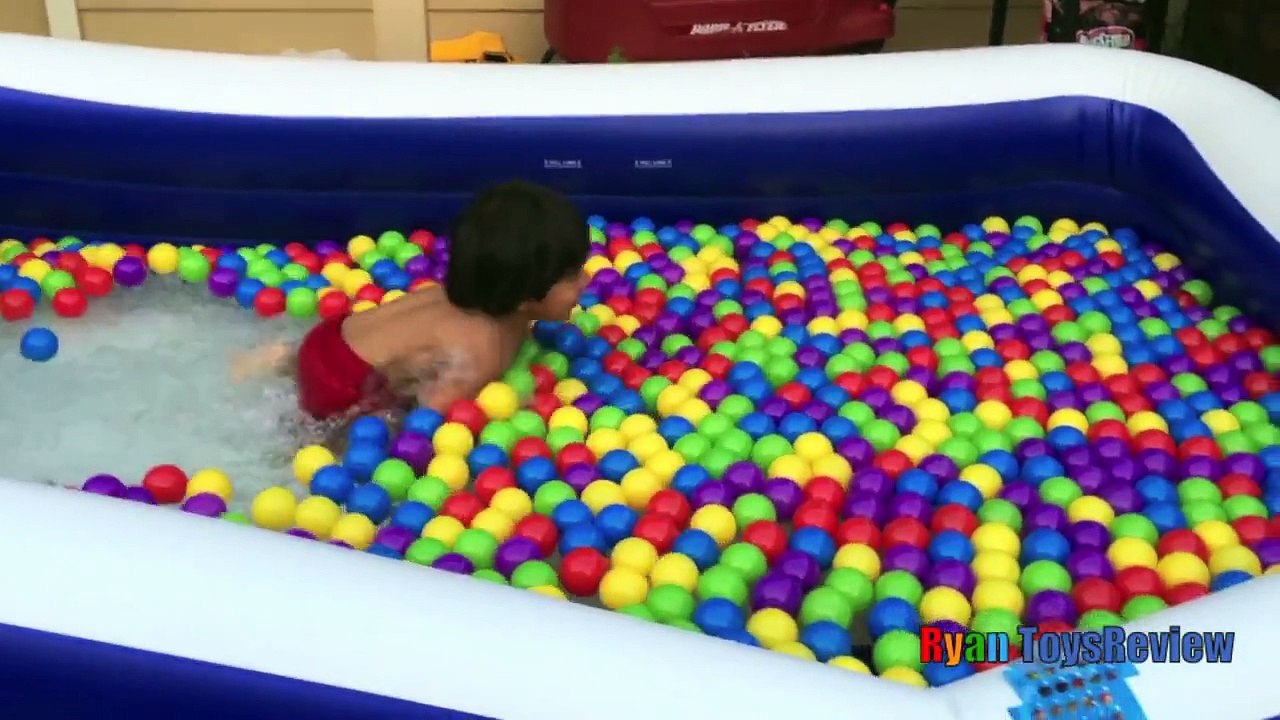 GIANT BALLOONS SURPRISE TOYS and Ball Pit challenge in huge pool Disney toys Ryan ToysReview