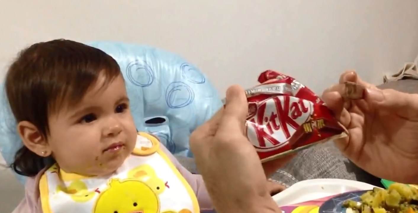 Cute Baby Vs kitkat chocolate