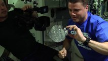 ISS Astronautes playing with water and camera
