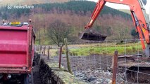 Locals step in to speed up repair of Cumbria road after flooding