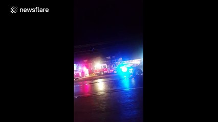 Footage of damage and emergency services on the i30 following Garland tornado