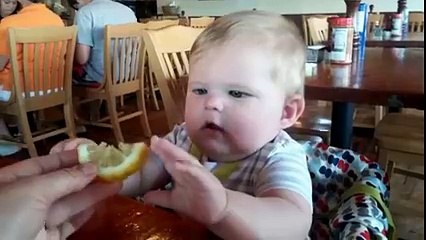 Baby tries his first lemon
