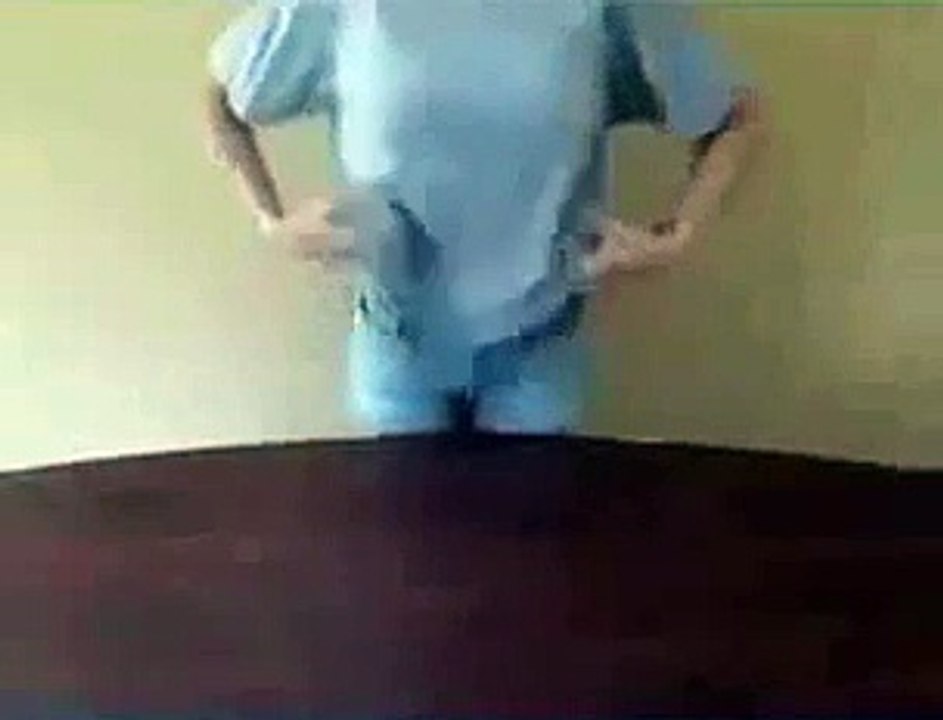 Gorgeous Lady shows us how to fold a Shirt in 3 seconds.