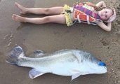 Family Pull an Almost One-Meter-Long Cod From River