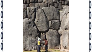 Guide talking to tourists at the Inca fortifi - 30 x 20in Canvas Print - Framed and ready to