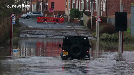 4x4 tackles flooded road near Leeds