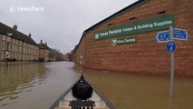 Man explores flooded York in canoe