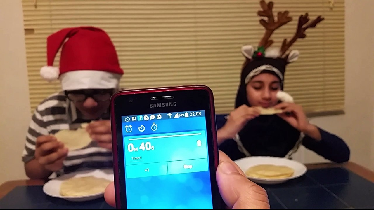Santa and reindeer Christmas poppadoms eating challenge