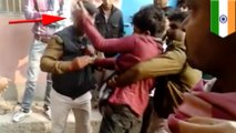 Indian youth goes slap for slap with  police officer in the streets of Bihar