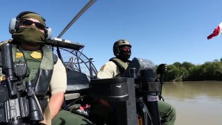 U.S CBP Men Patrolling Inside a Supercharged Engine Airboat Customs And Border Protection