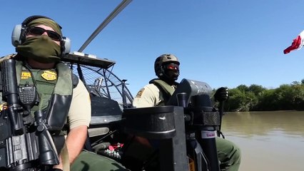 U.S CBP Men Patrolling Inside a Supercharged Engine Airboat Customs And Border Protection