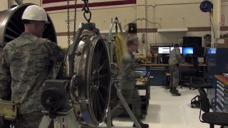 US Air Force Men Repair a Huge F-16 Jet Engine Damaged by Aerial Debris