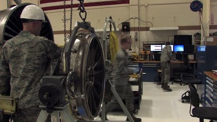 US Air Force Men Repair a Huge F-16 Jet Engine Damaged by Aerial Debris