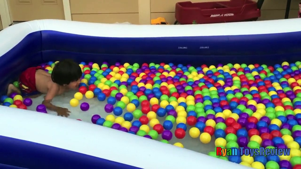 GIANT BALLOONS SURPRISE TOYS and Ball Pit challenge in huge pool Disney toys Ryan ToysReview