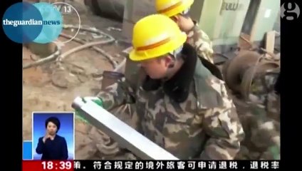 Moment Chinese mine survivors are found using infrared camera