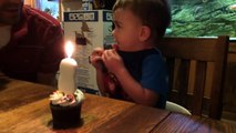 Kid Trying to Blow Out Birthday Candle - Very Funny