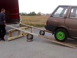 Dumb or just so talented... Amazing method to load car into truck
