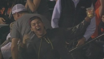 Fan comes up with foul ball