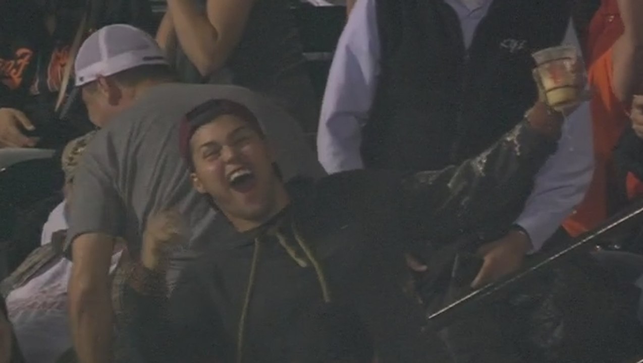 Fan comes up with foul ball