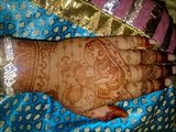 Brides and Groom in Traditional Wedding Mehandi Henna Designs
