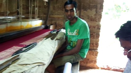 Weavers busy in collecting threads in orissa