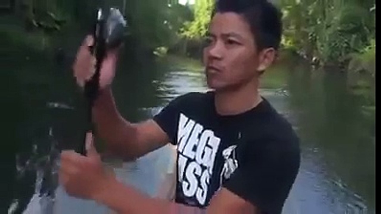 Amazing fishing video of a boy in hot water