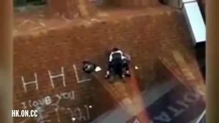 Lustful students caught on camera enjoying passionate embrace on ROOFTOP next to huge 'I LOVE YOU'