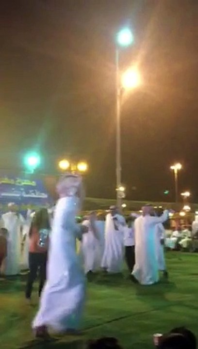 Arabic girl dancing In crowed