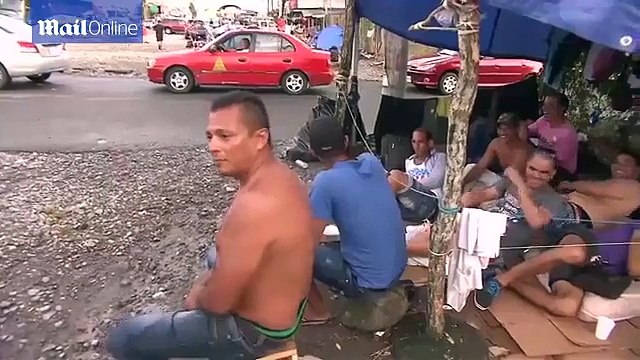 Stranted Cuban migrants wait in Costa Rica to cross border