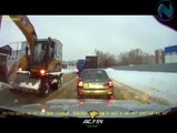 Excavator Truck driver helps stuck Truck to go with his 