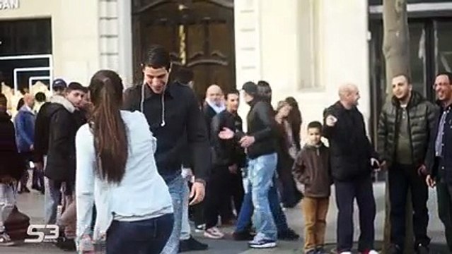 She Was Walking On The Street With A Ball, When She Stops And Puts The Ball Down Everyone Stops