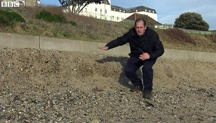 Storms expose oil buried decades ago under Norfolk beach