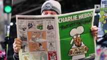 Charlie Hebdo marks anniversary of attack with gun-wielding God