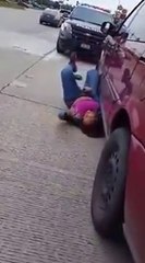 Druged woman with Bath Salts lies down into road Traffic Watch Video